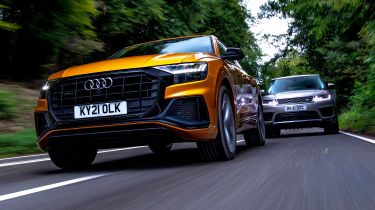 Audi Q8 55 TFSI e vs Range Rover Sport P400e - front