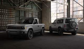 Slate pick-up truck and SUV - front static