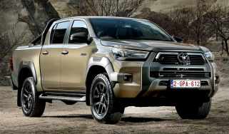 2025 Toyota Hilux Hybrid 48V - static front 3/4 in desert